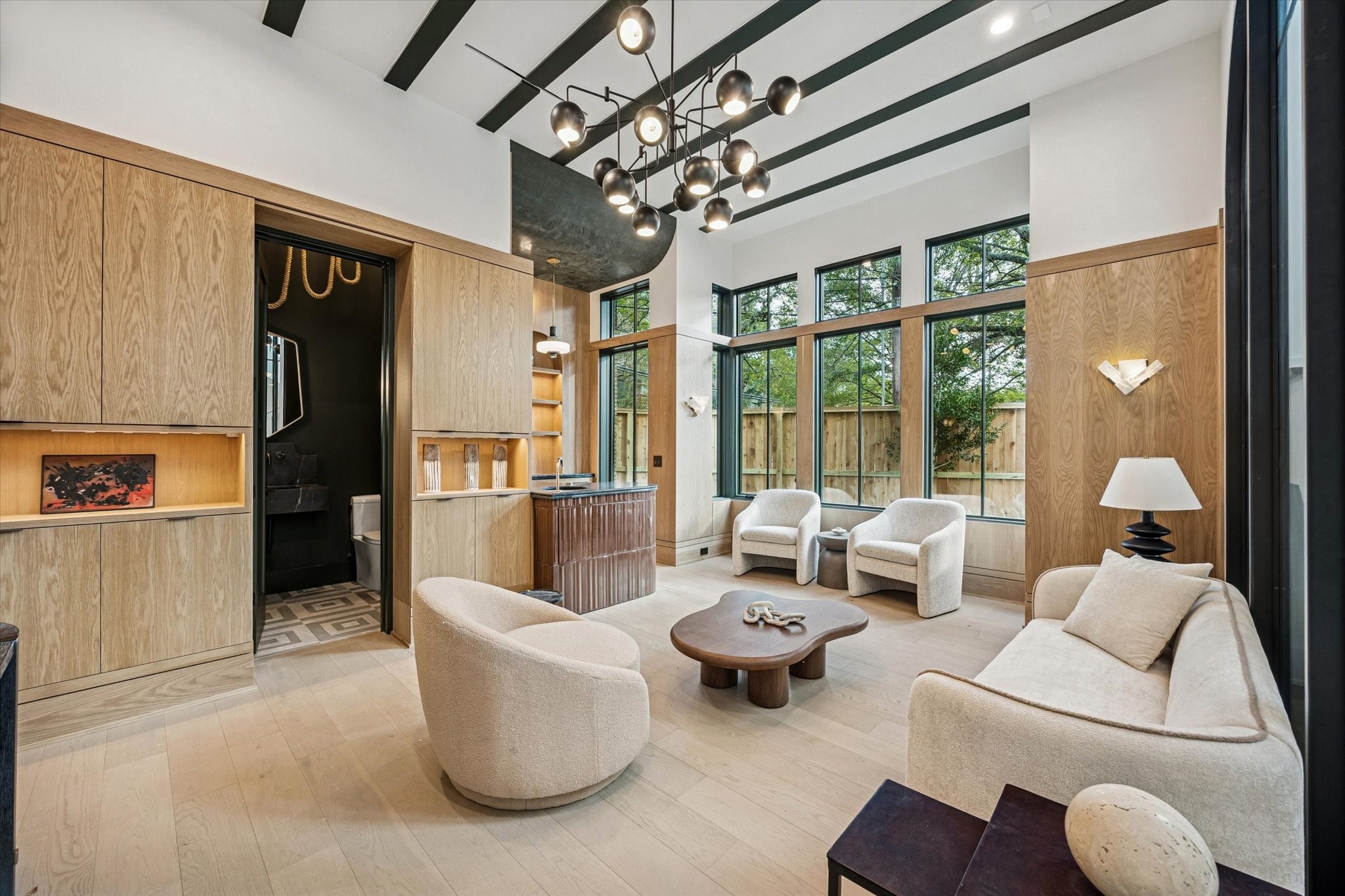 1801 Sunset Boulevard Houston, TX 77005 - Photo 3 of 20 a living room with furniture and a chandelier