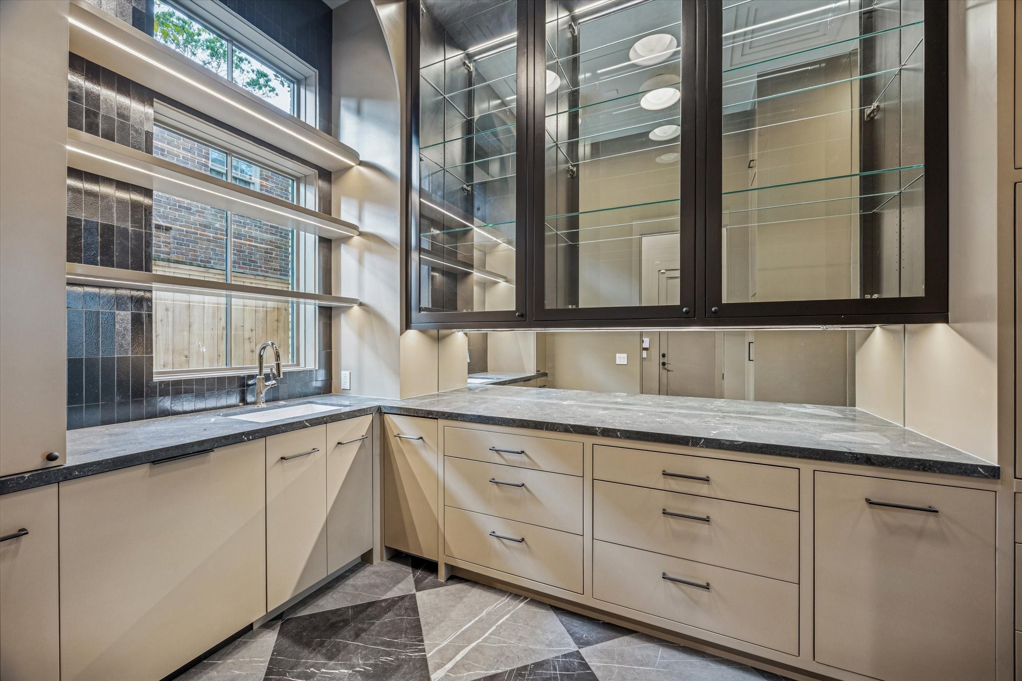 1801 Sunset Boulevard Houston, TX 77005 - Photo 8 of 20 a bathroom with a granite countertop sink and mirror