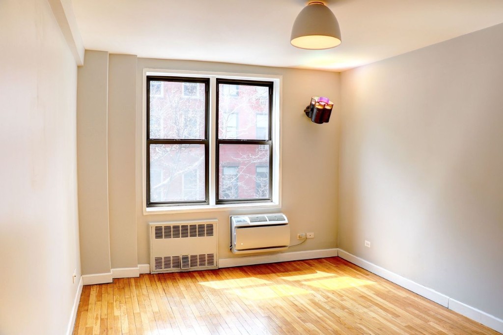 211 East 18th Street, Unit 2P Manhattan, NY 10003 - Photo 10 of 18 a view of an empty room with a window