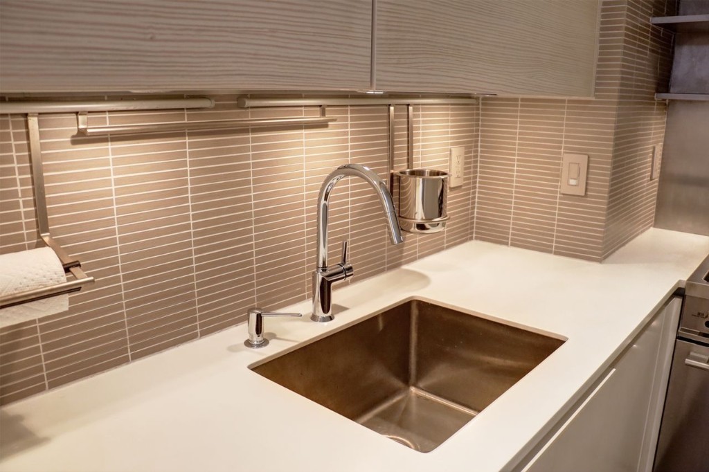 211 East 18th Street, Unit 2P Manhattan, NY 10003 - Photo 13 of 18 a kitchen with a sink and a window