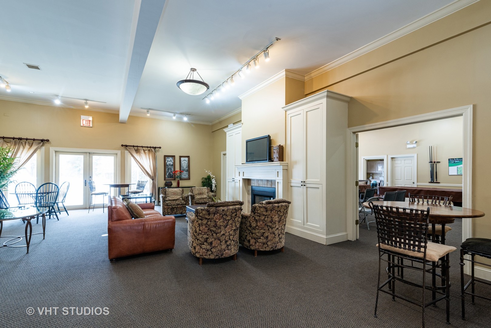 920 Ridge Square, Unit 216 Elk Grove Village, IL 60007 - Photo 11 of 12 a living room with furniture and a large window