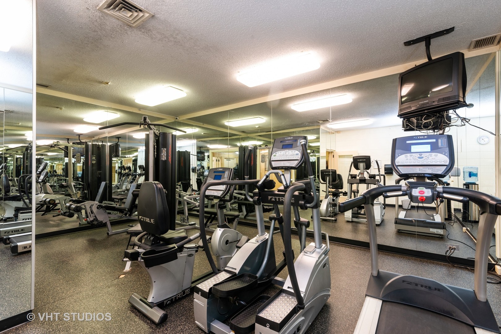 920 Ridge Square, Unit 216 Elk Grove Village, IL 60007 - Photo 10 of 12 a view of a room with gym equipment