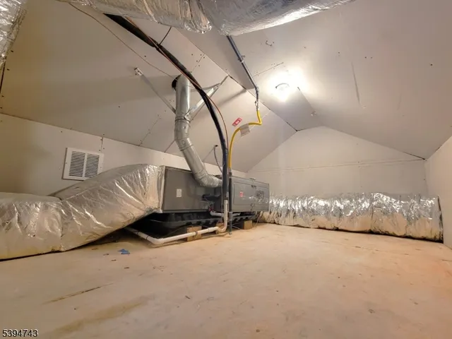 a view of a livingroom with a staircase