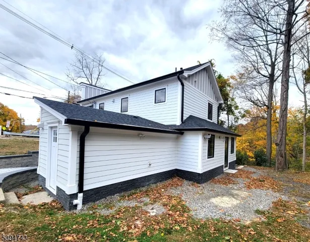 a front view of house with yard