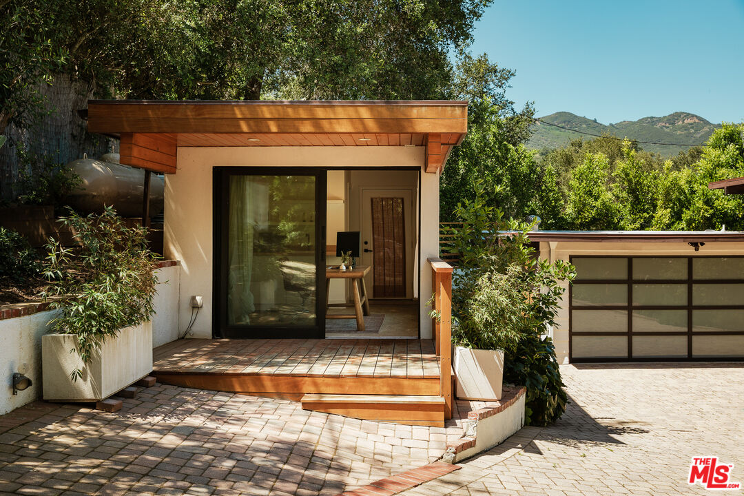 26237 Fairside Road Malibu, CA 90265 - Photo 4 of 34 a view of a entryway door front of house