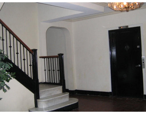90 Kilsyth Road, Unit 33 Boston, MA 02135 - Photo 8 of 8 a view of a hallway with wooden floor and staircase
