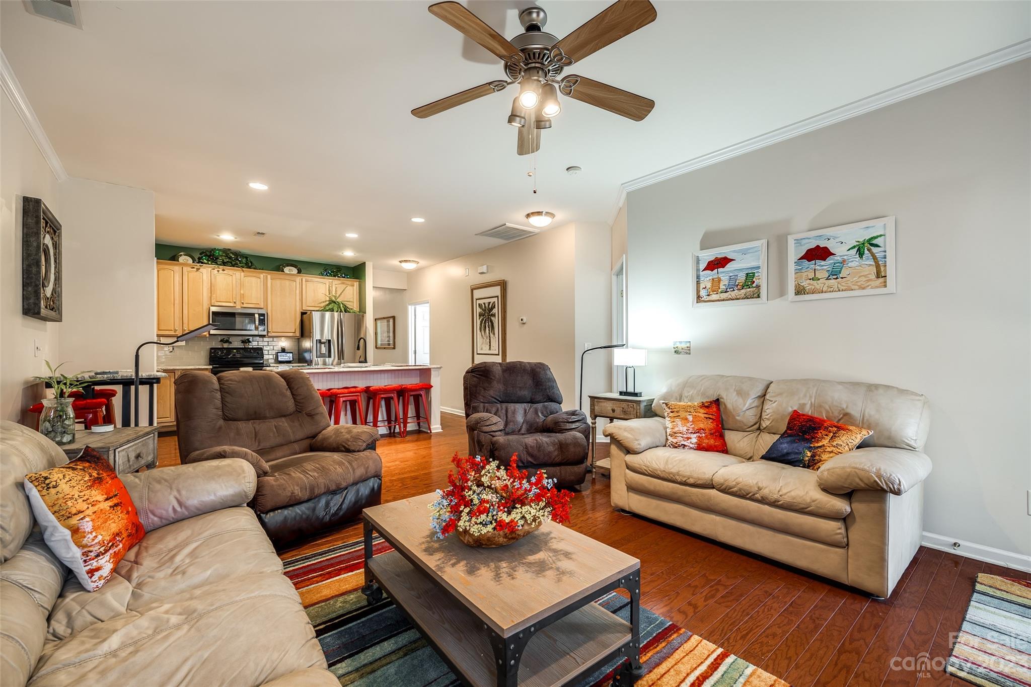 1659 Onyx Ridge Fort Mill, SC 29708 - Photo 22 of 42 a living room with furniture kitchen view and a chandelier