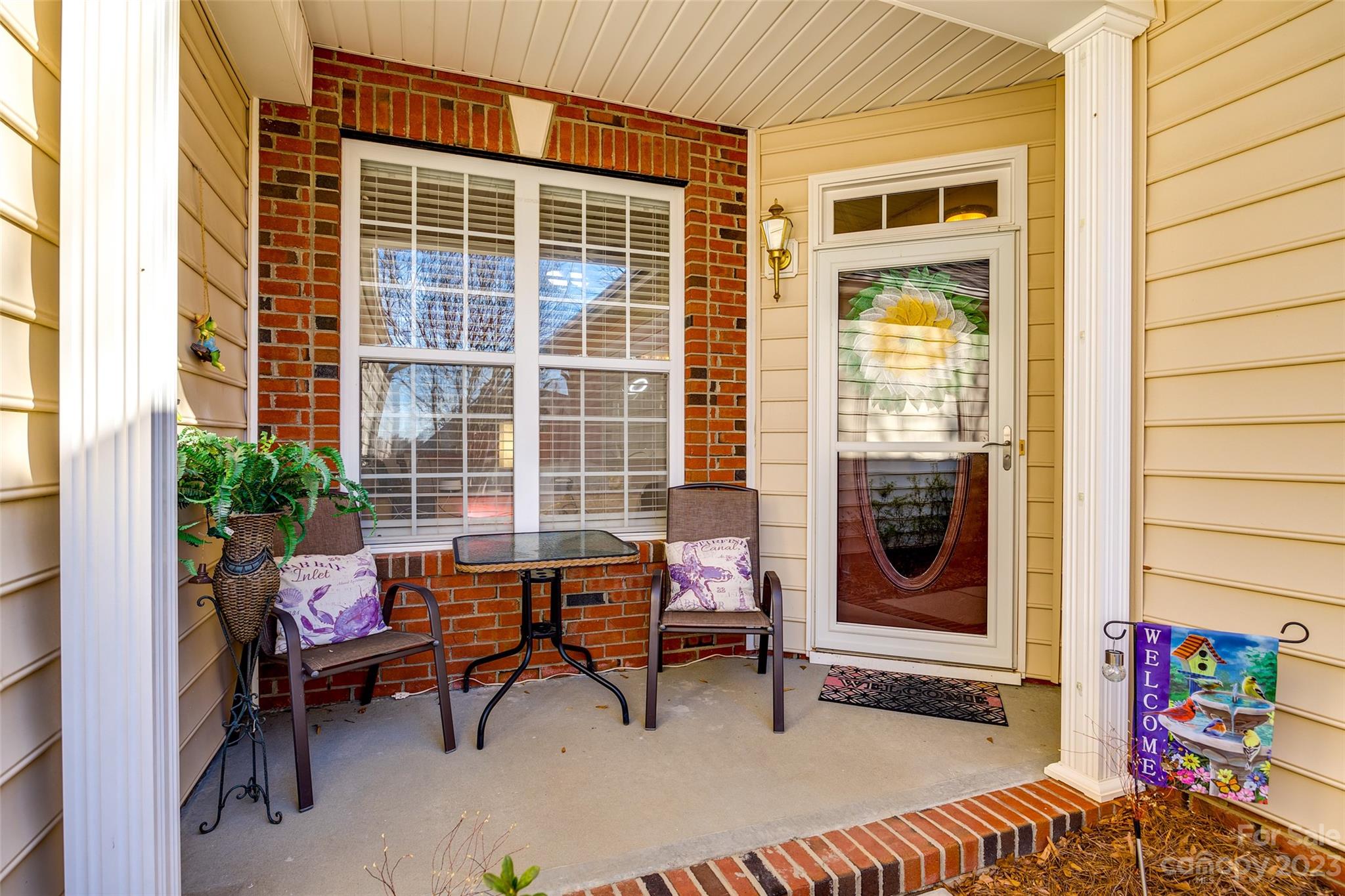 1659 Onyx Ridge Fort Mill, SC 29708 - Photo 3 of 42 a building outdoor space with patio furniture and potted plants