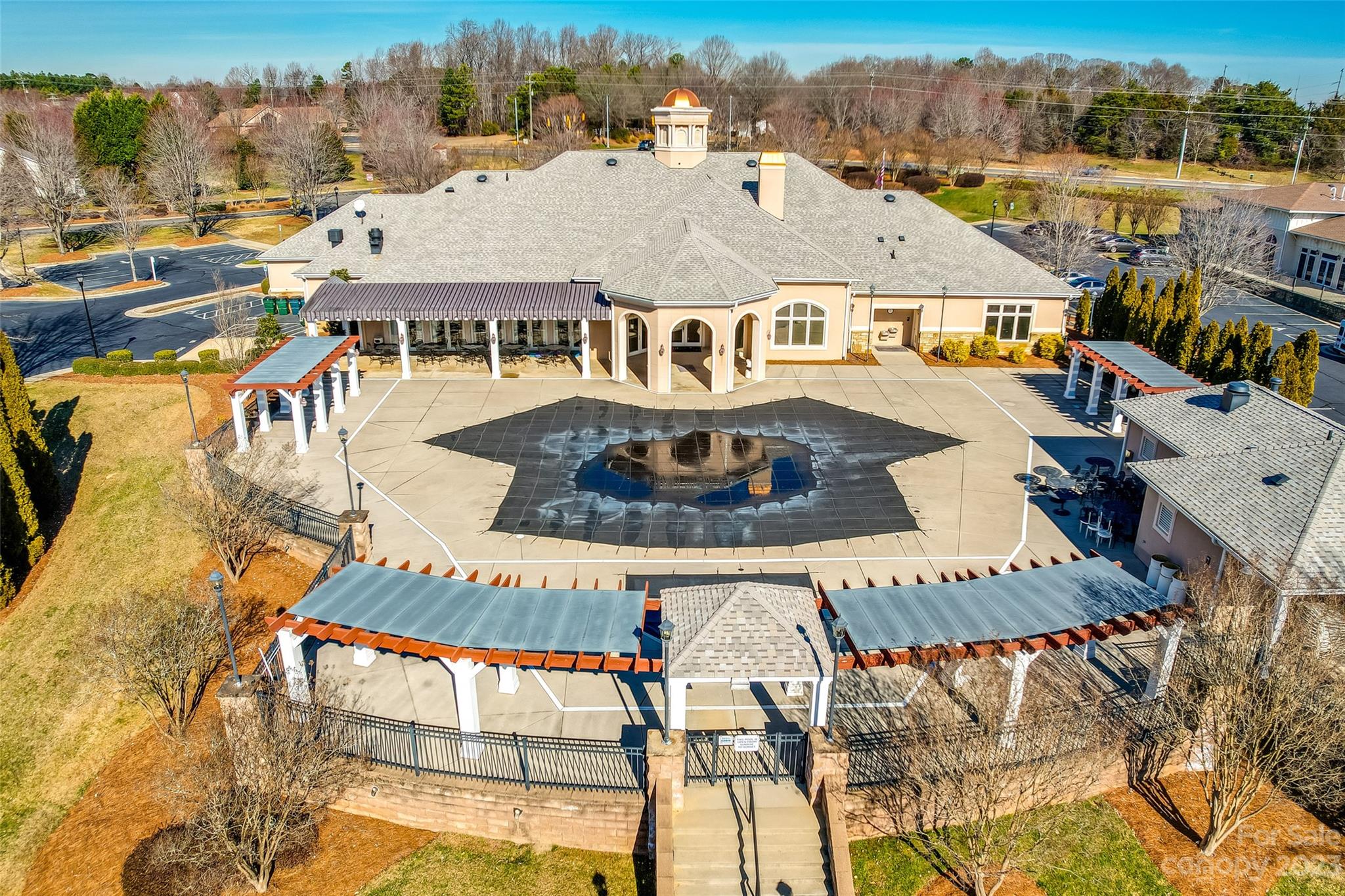 1659 Onyx Ridge Fort Mill, SC 29708 - Photo 34 of 42 an aerial view of a house with swimming pool and mountains