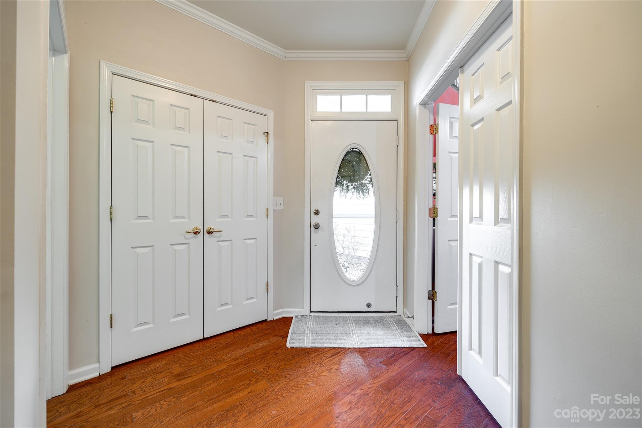 1659 Onyx Ridge Fort Mill, SC 29708 - Photo 4 of 42 an empty room with wooden floor and windows