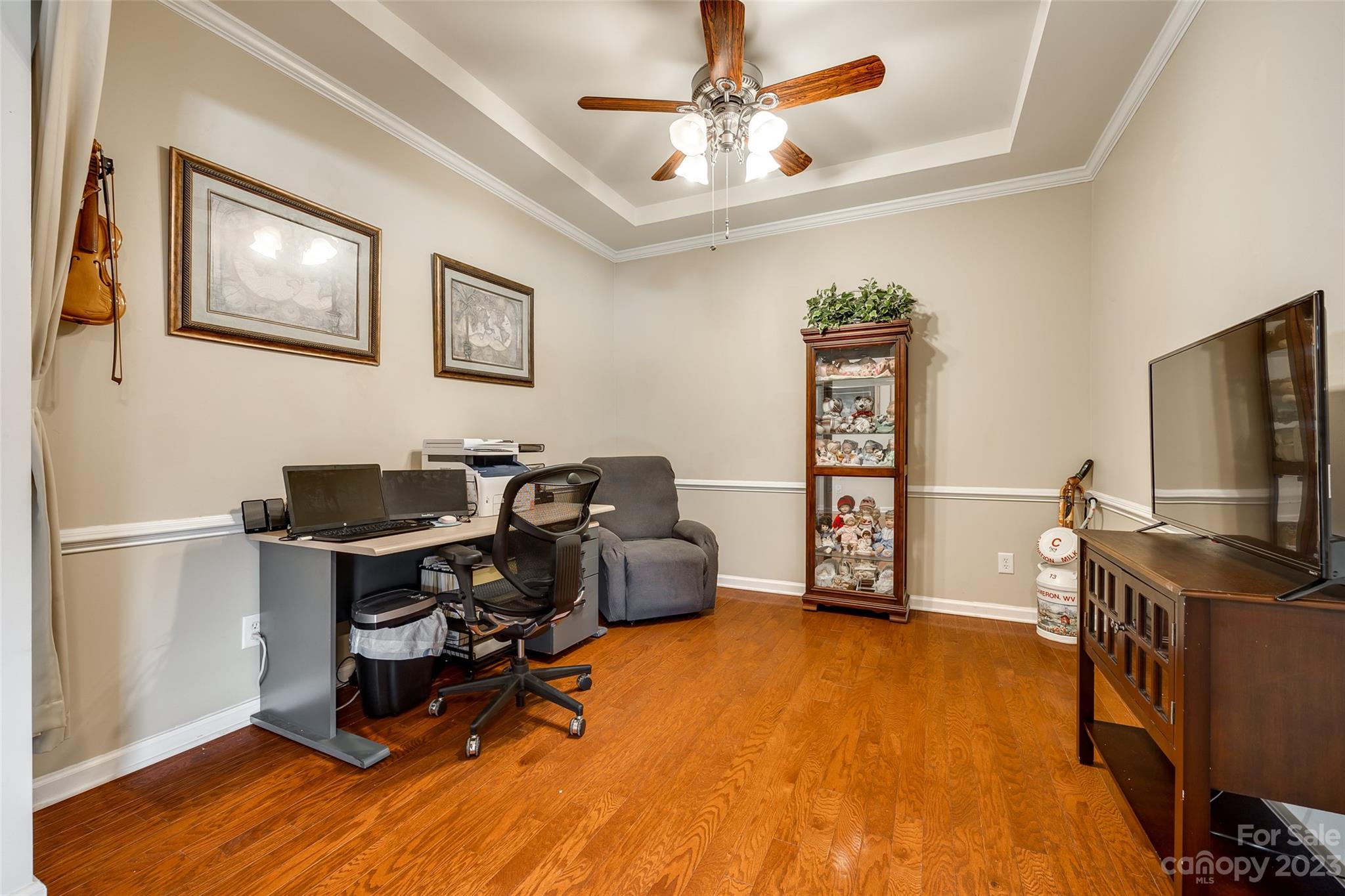 1659 Onyx Ridge Fort Mill, SC 29708 - Photo 6 of 42 a living room with furniture and a flat screen tv