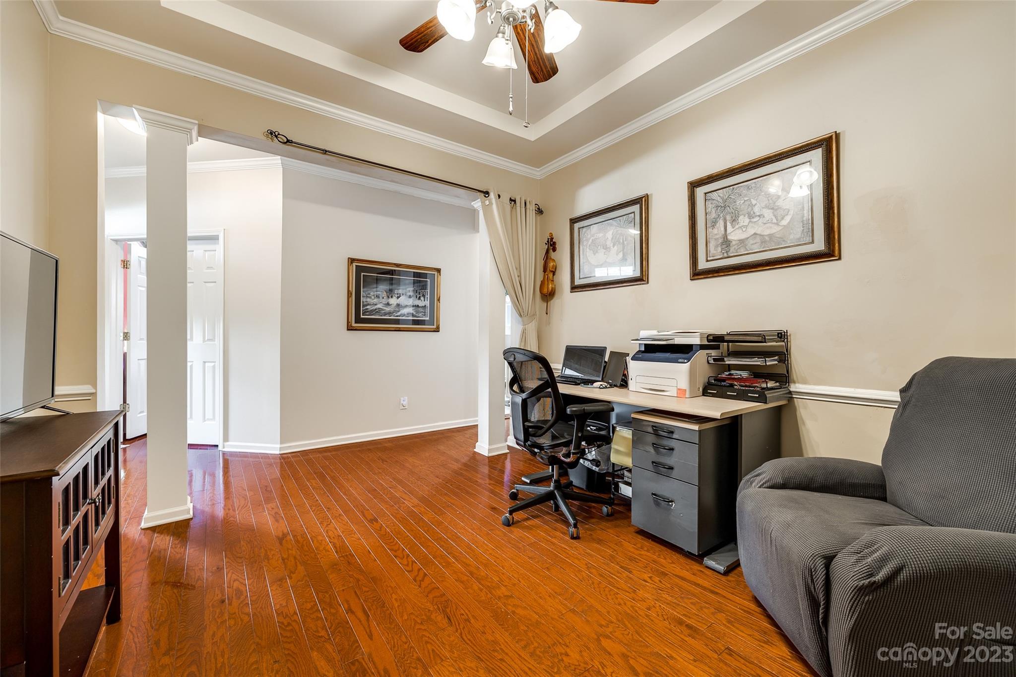 1659 Onyx Ridge Fort Mill, SC 29708 - Photo 7 of 42 a view of a livingroom with workspace and a couch