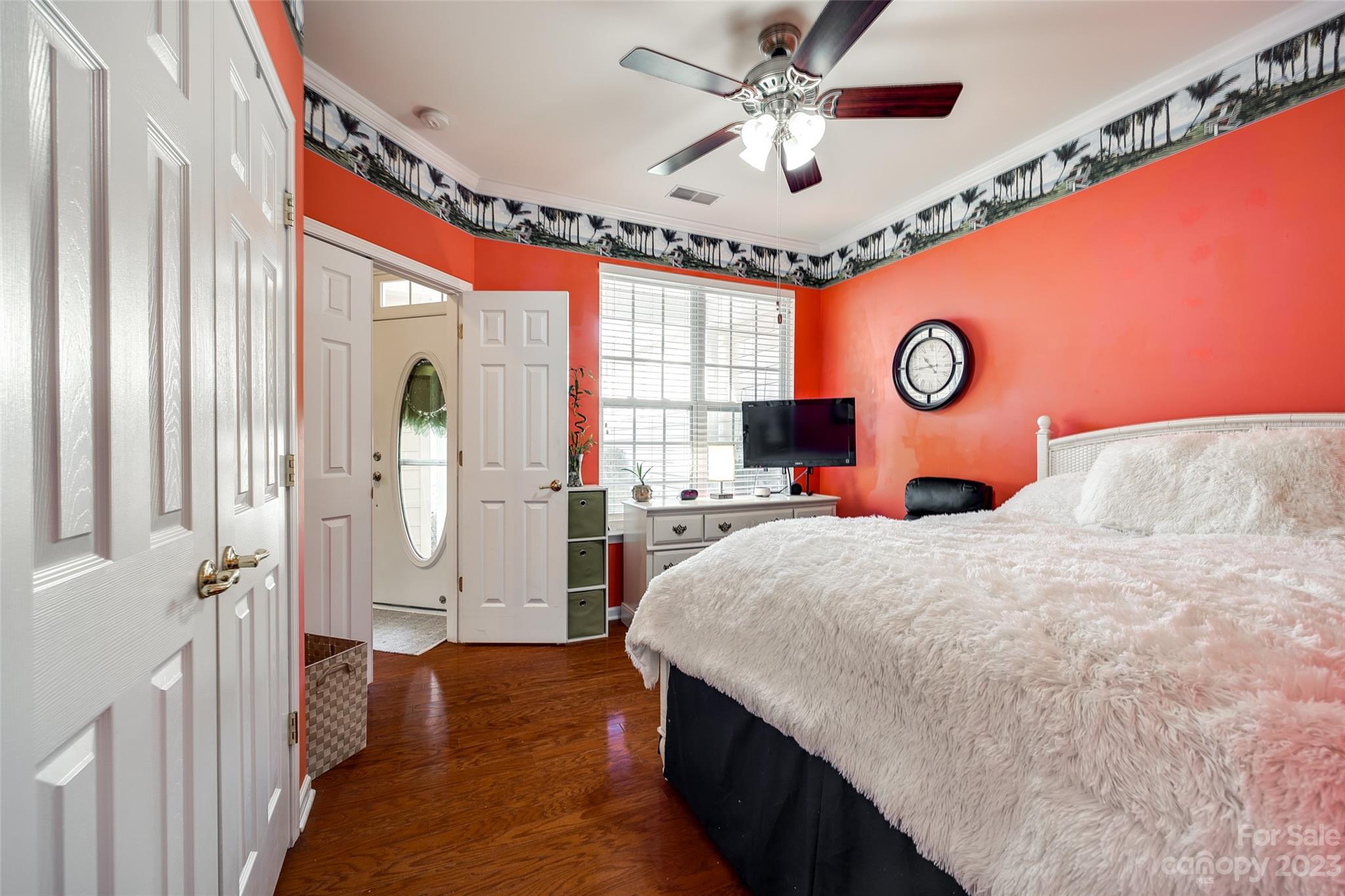 1659 Onyx Ridge Fort Mill, SC 29708 - Photo 10 of 42 a bedroom with a bed and a chandelier