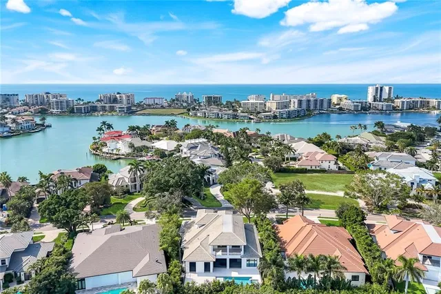 a view of entryway with wooden floor and a chandelier