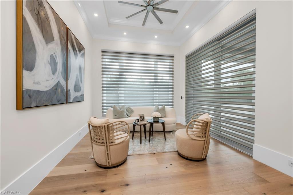 3190 Crayton Road Naples, FL 34103 - Photo 13 of 45 Remote shades in sitting area