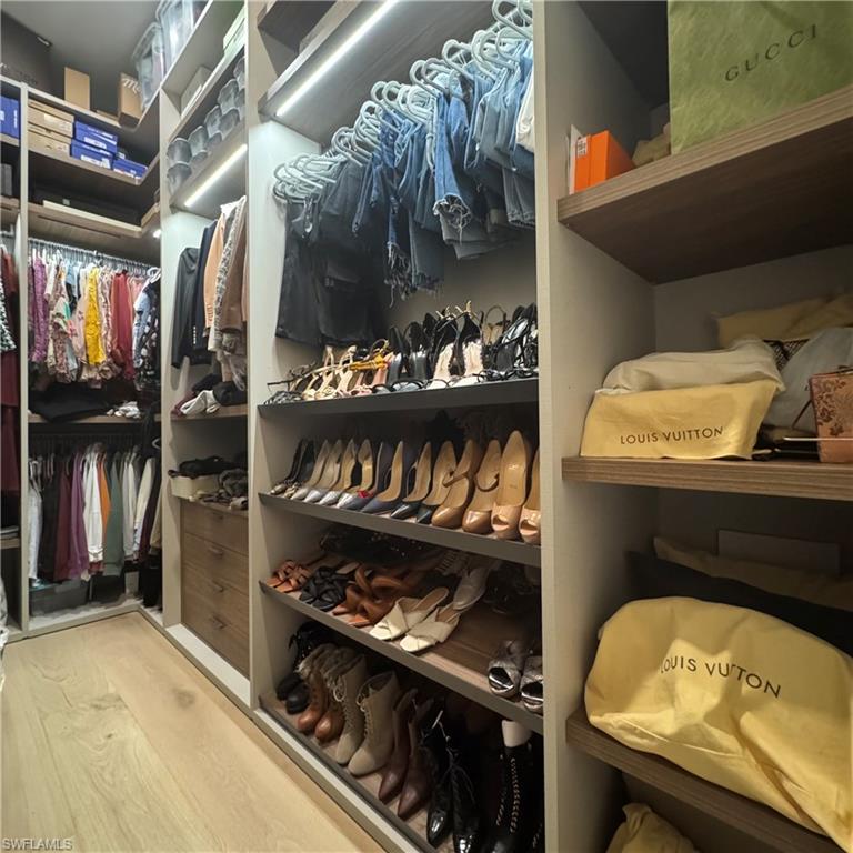 3190 Crayton Road Naples, FL 34103 - Photo 20 of 48 a room with storage and utility