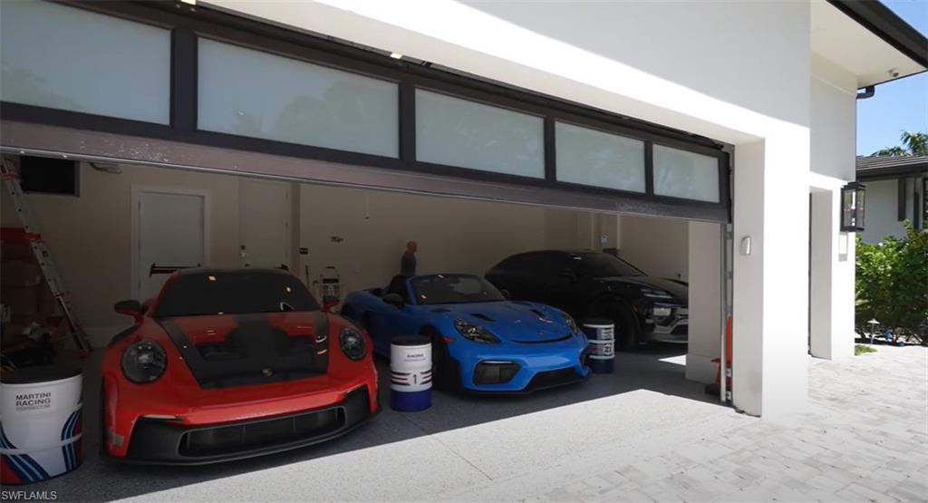 3190 Crayton Road Naples, FL 34103 - Photo 34 of 45 Spacious 3 car garage with ample storage