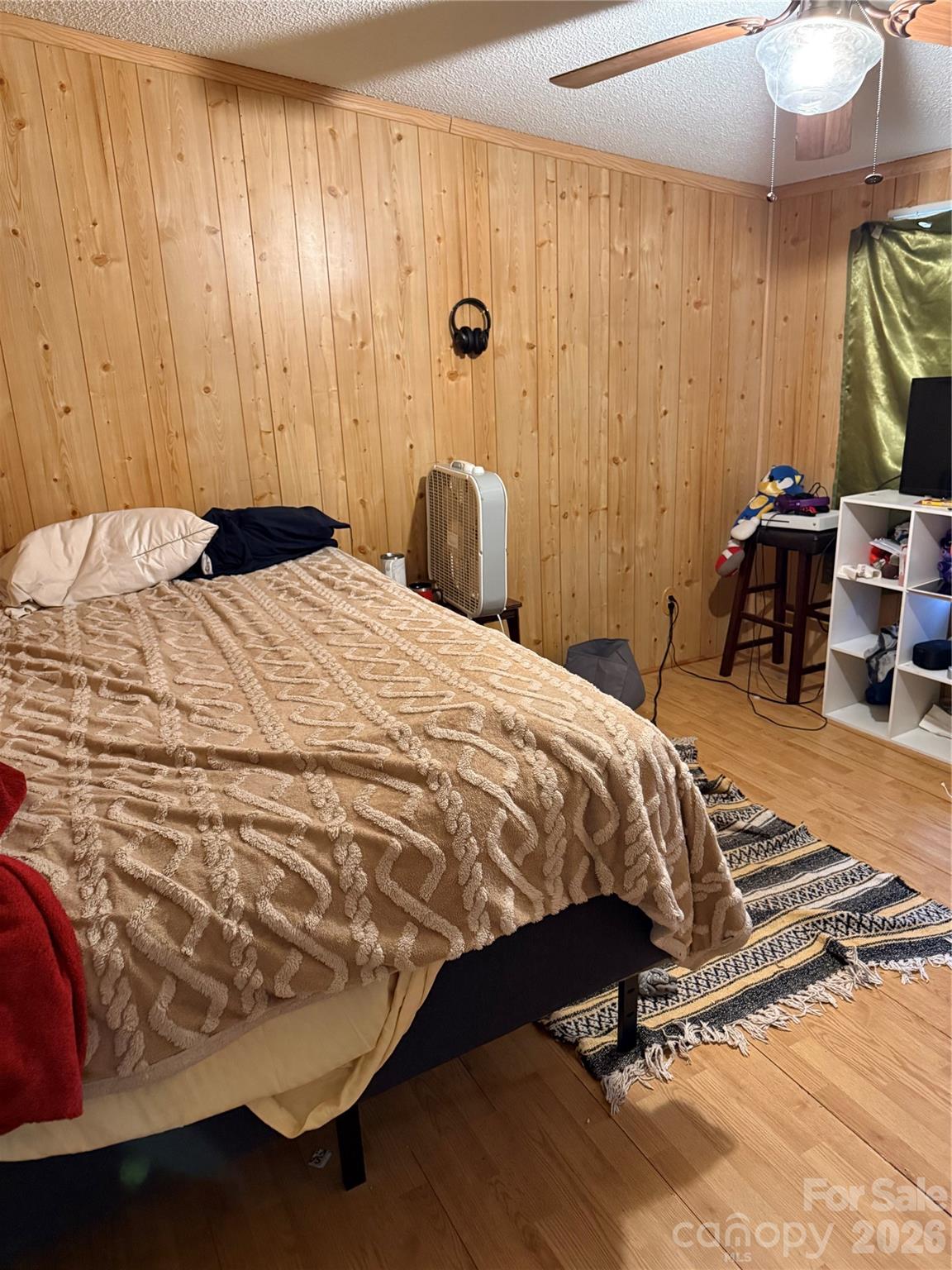 232 Fern Hill Road Troutman, NC 28166 - Photo 6 of 12 a bedroom with a bed and a mirror