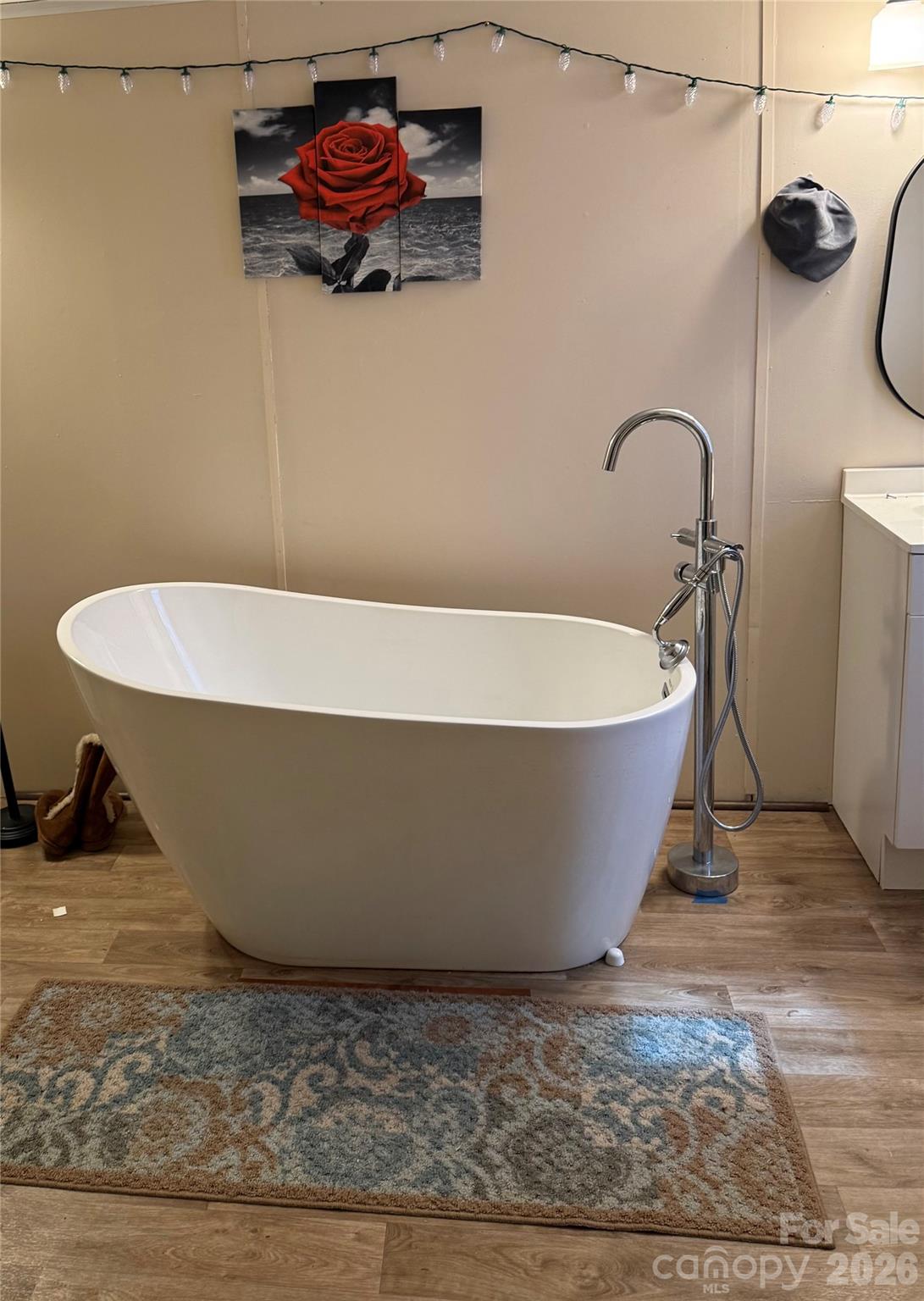 232 Fern Hill Road Troutman, NC 28166 - Photo 9 of 12 a white bath tub sitting in a bathroom