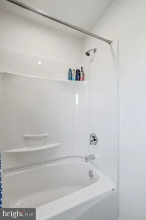 a bathroom with a bathtub