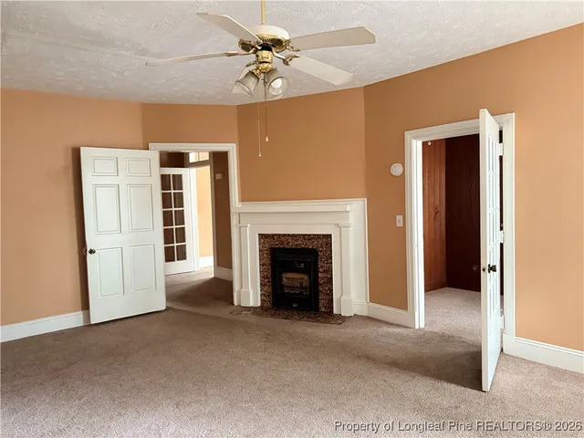 a view of a livingroom with a fireplace
