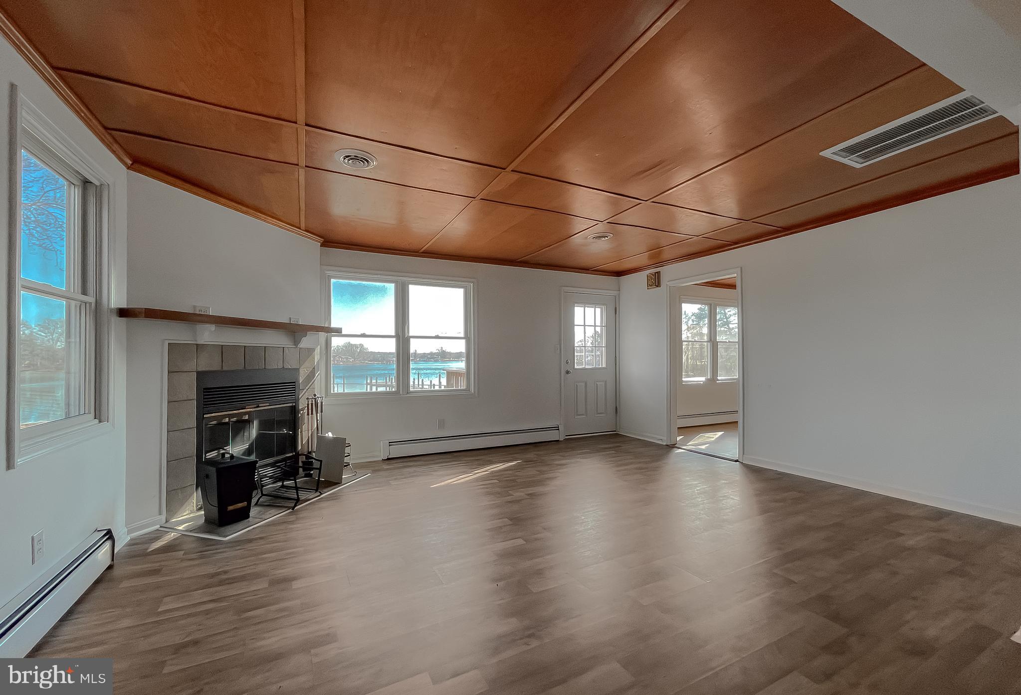 37117 Moore Road Bushwood, MD 20618 - Photo 13 of 45 a view of a room with window and fireplace