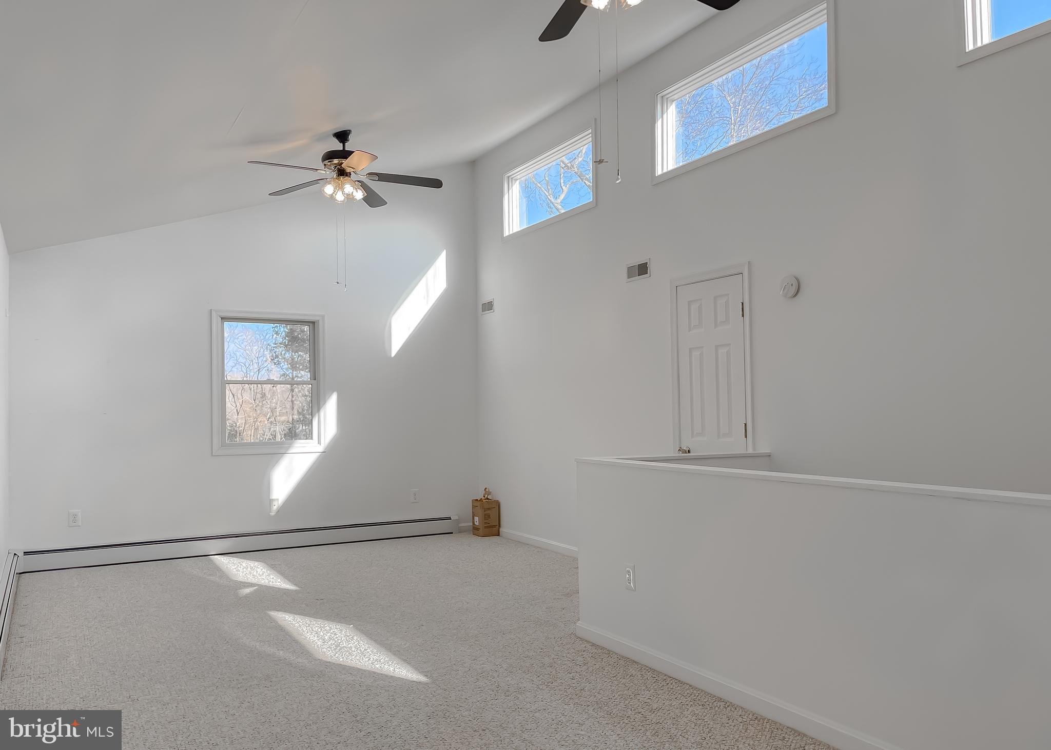 37117 Moore Road Bushwood, MD 20618 - Photo 27 of 45 a view of an empty room with a window