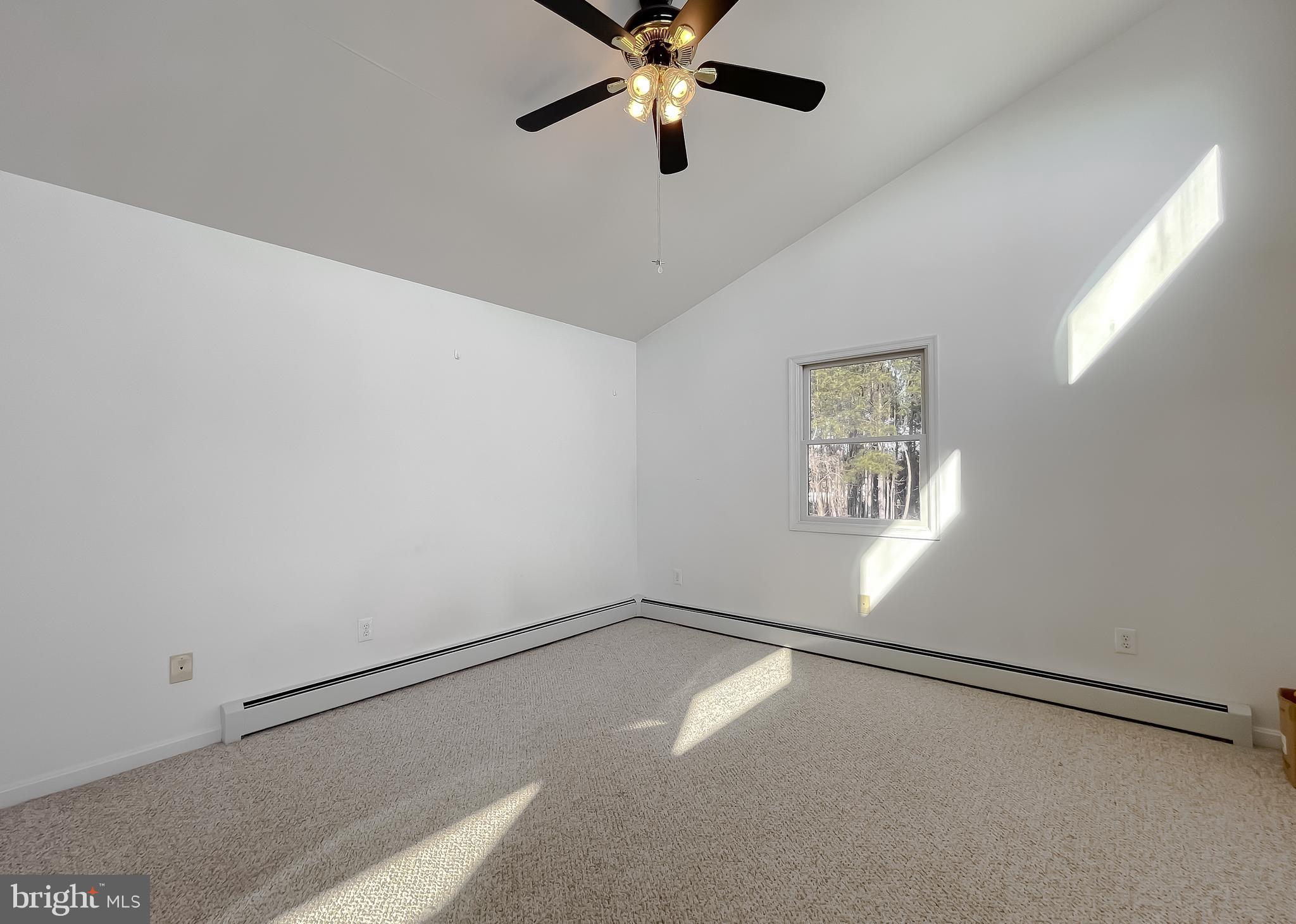 37117 Moore Road Bushwood, MD 20618 - Photo 28 of 45 a view of a room with window and ceiling fan