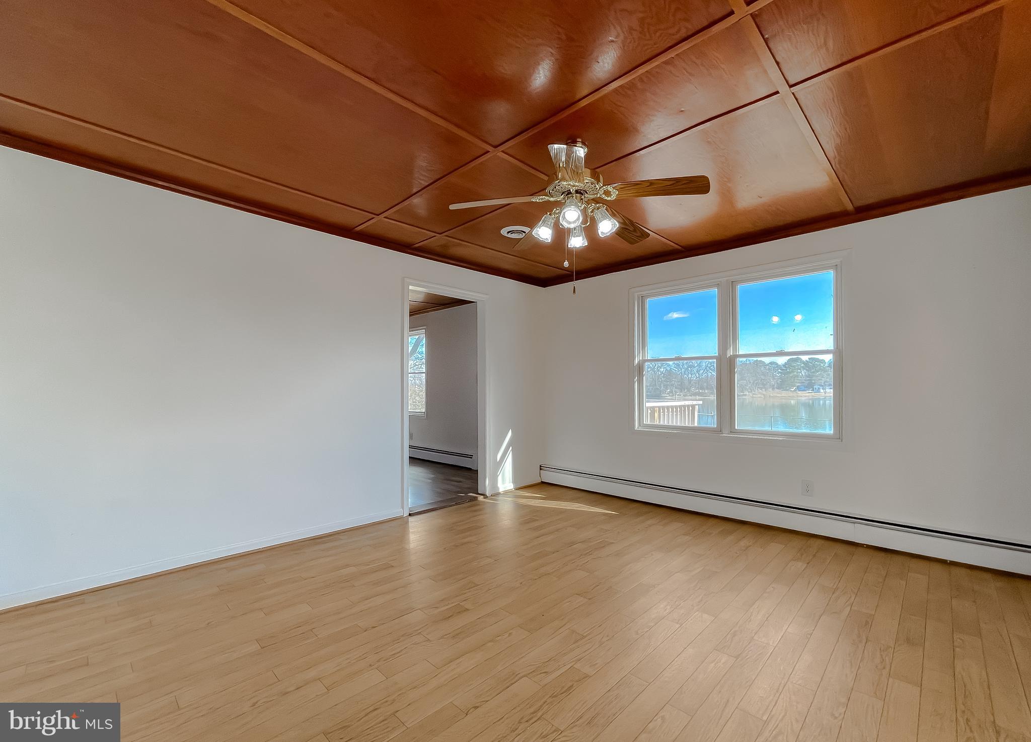 37117 Moore Road Bushwood, MD 20618 - Photo 35 of 45 a view of an empty room with a window