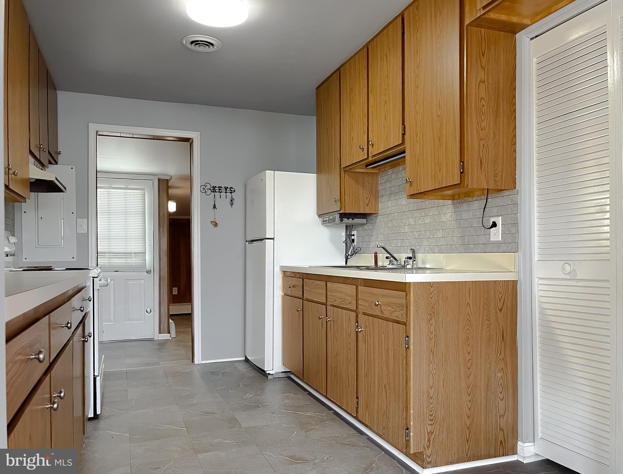 37117 Moore Road Bushwood, MD 20618 - Photo 39 of 45 a bathroom with a sink a mirror and a shower