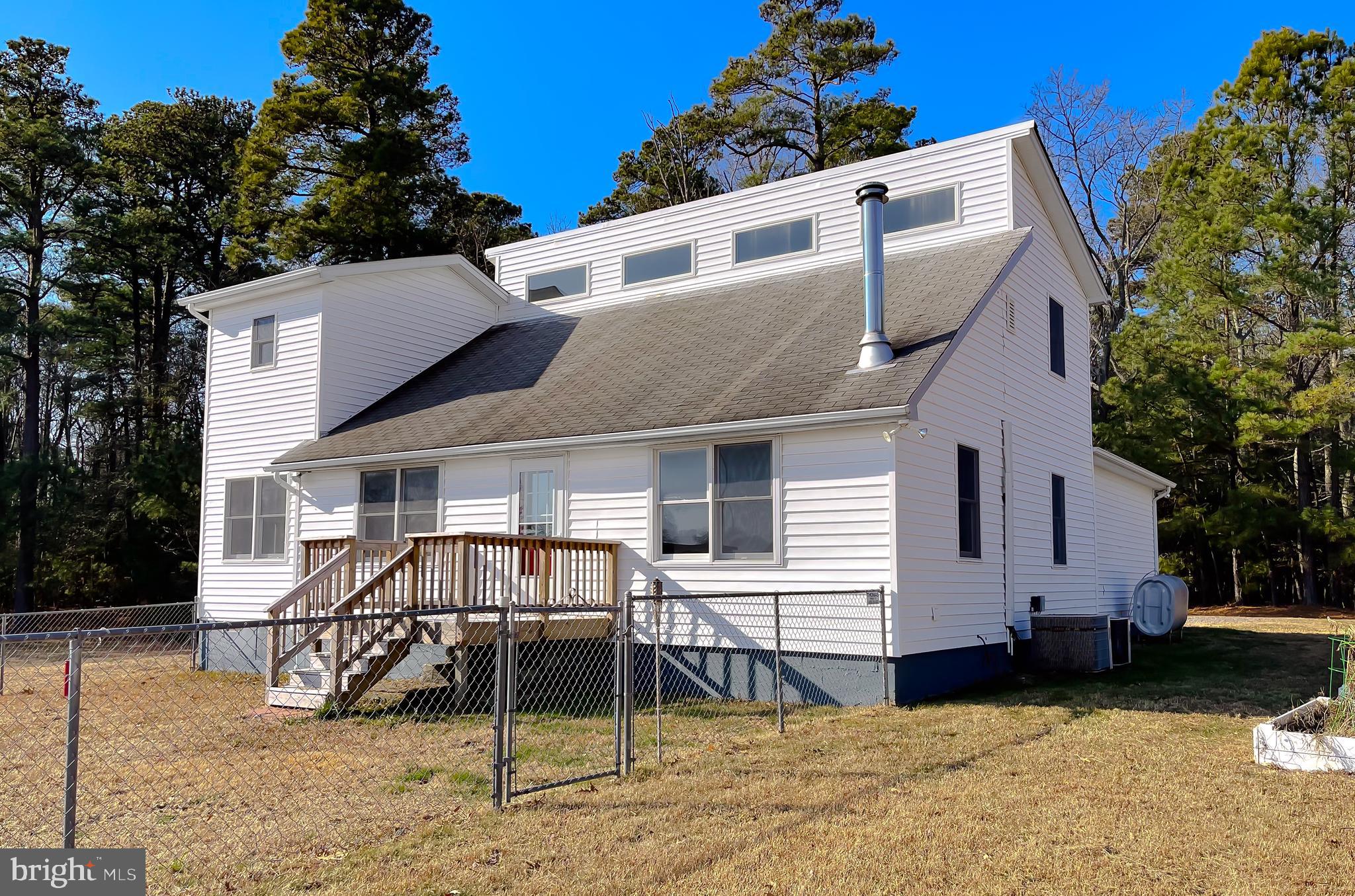 37117 Moore Road Bushwood, MD 20618 - Photo 4 of 45 a view of a house with backyard