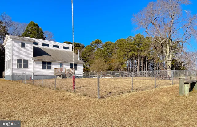 a view of a backyard of a house