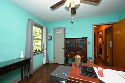 a bedroom with furniture and closet