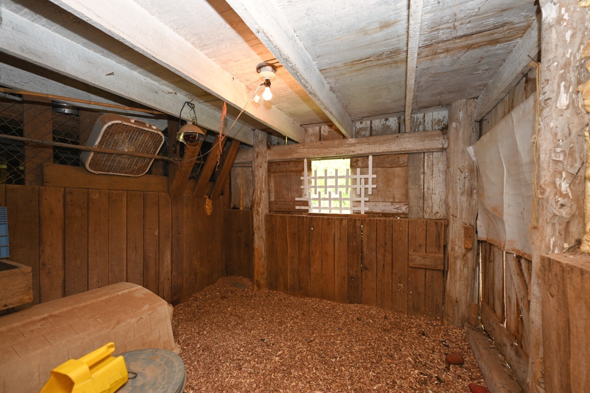 4411 Jackson Road Whites Creek, TN 37189 - Photo 52 of 63 a bedroom with a bed and a chandelier