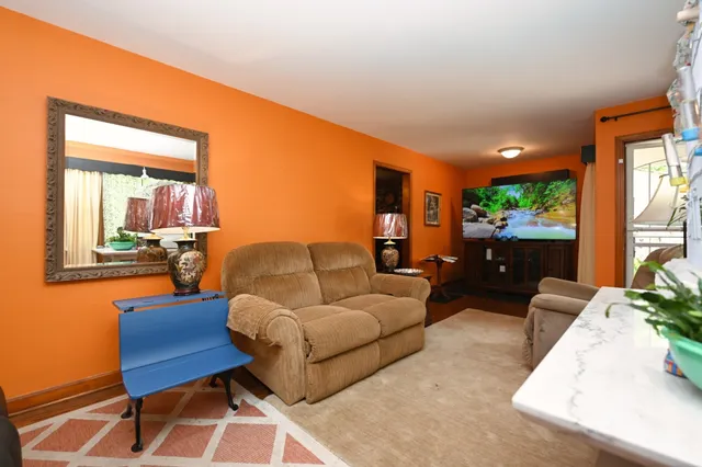 a very nice looking dining room with a large window