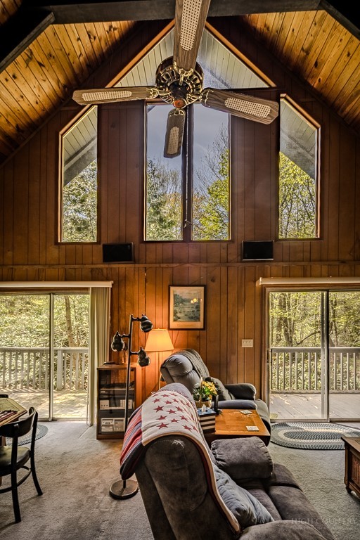 107-109 Shagbark Road Beech Mountain, NC 28604 - Photo 10 of 45 a bedroom with furniture and a window