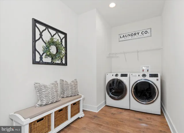 a utility room with dryer and washer