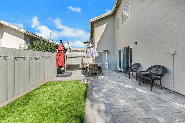 a view of a porch with wooden floor and stairs