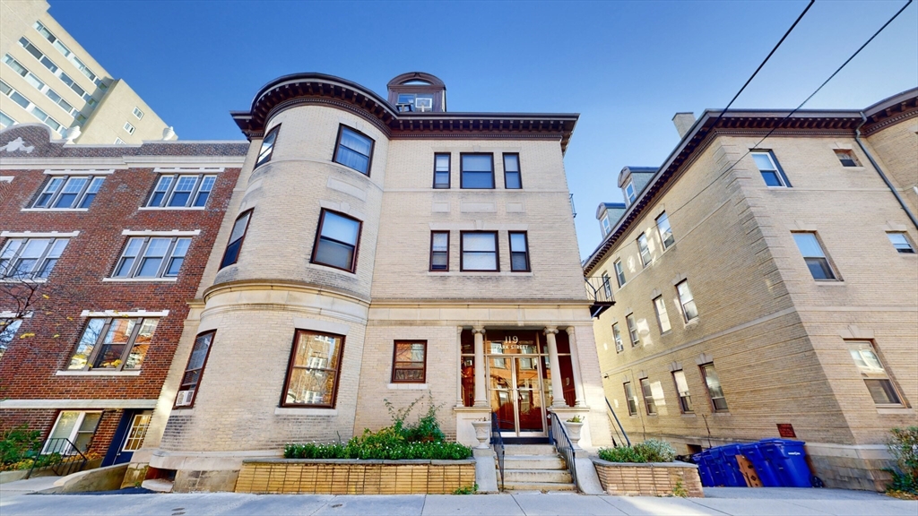 119 Park Street, Unit 3 Brookline, MA 02446 - Photo 10 of 10 a front view of residential houses with cars