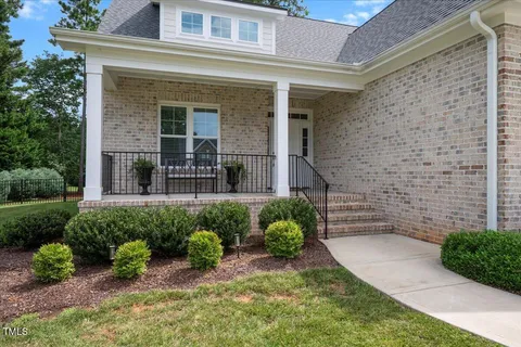 a view of house with outdoor space