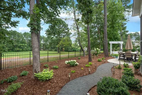 a garden view with a seating space