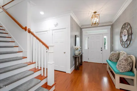 a view of entryway with wooden floor
