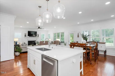 a view of a dining area with furniture window and wooden floor