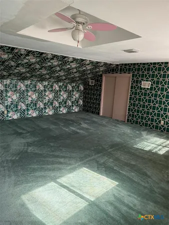 a view of a room with an empty space