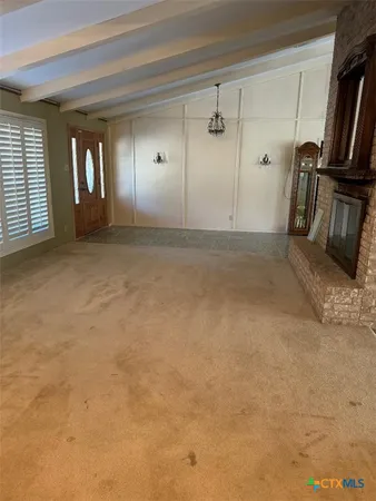 a view of a livingroom with a fireplace