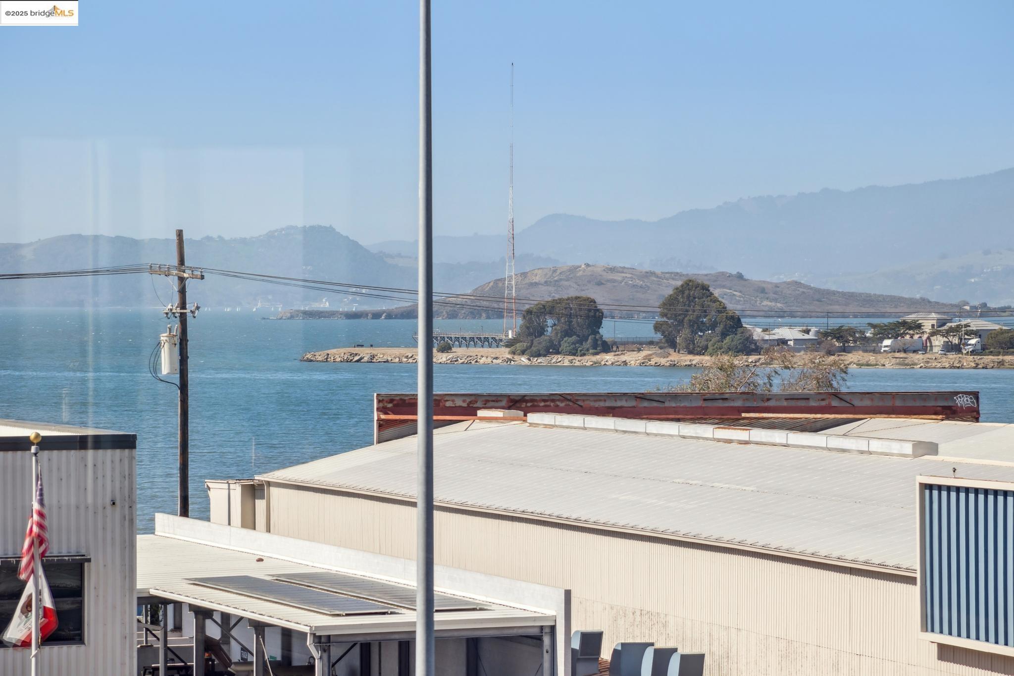 545 Pierce Street, Unit 1206 Albany, CA 94706 - Photo 12 of 44 a view of a balcony with floor to ceiling windows