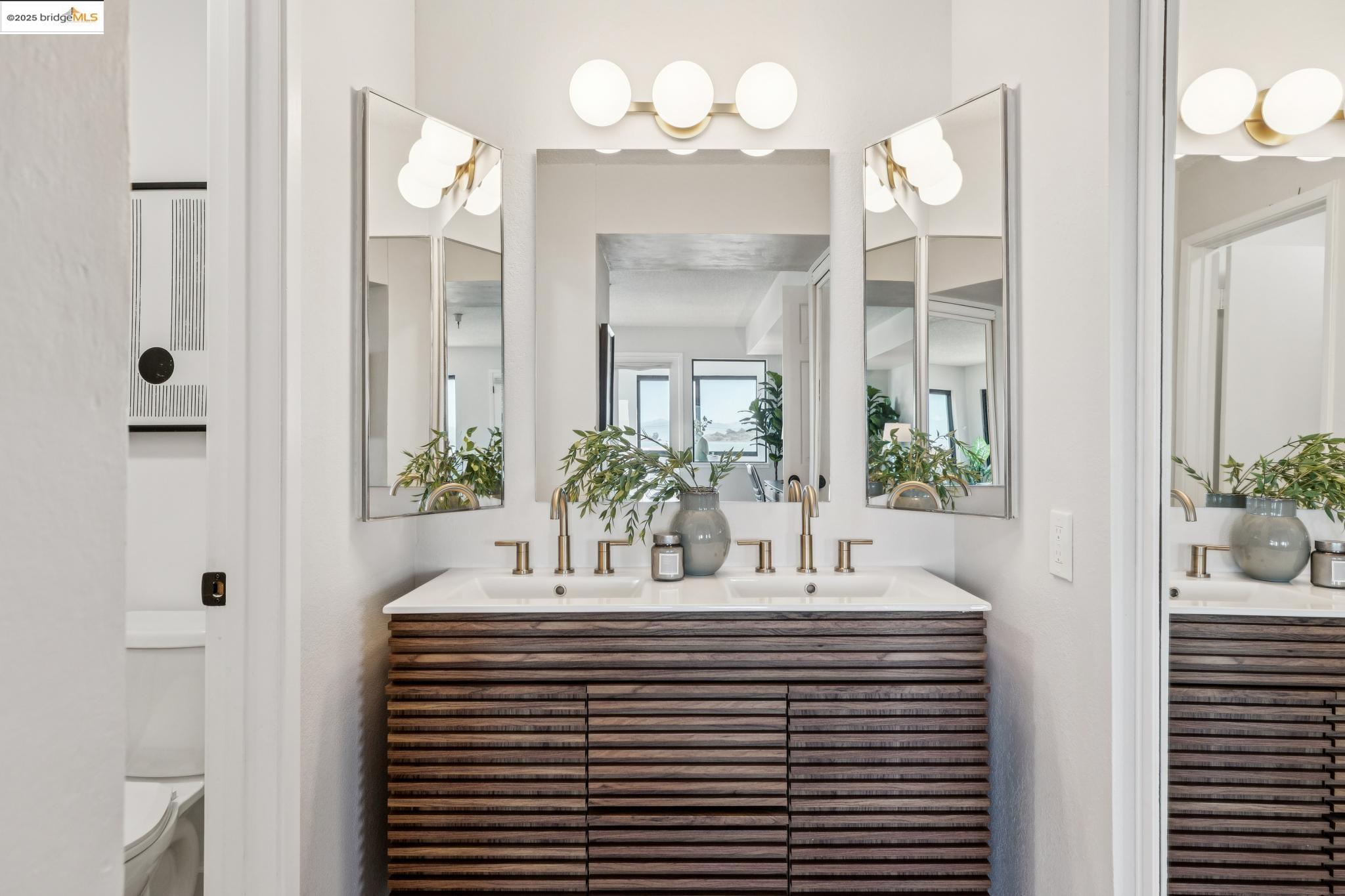 545 Pierce Street, Unit 1206 Albany, CA 94706 - Photo 27 of 44 a view of bathroom with a sink and mirror