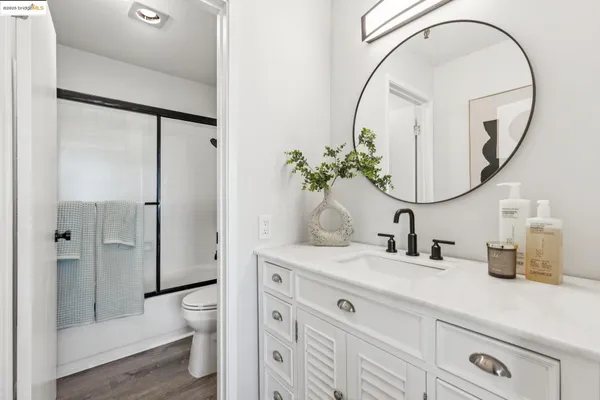 a view of storage and utility room with washer and dryer