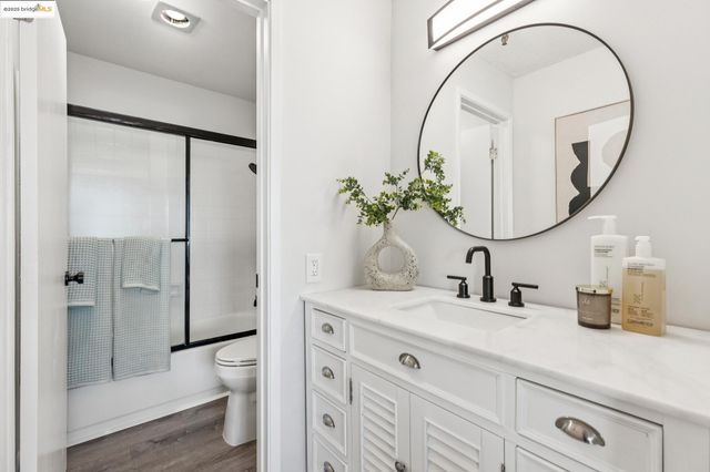 a view of storage and utility room with washer and dryer