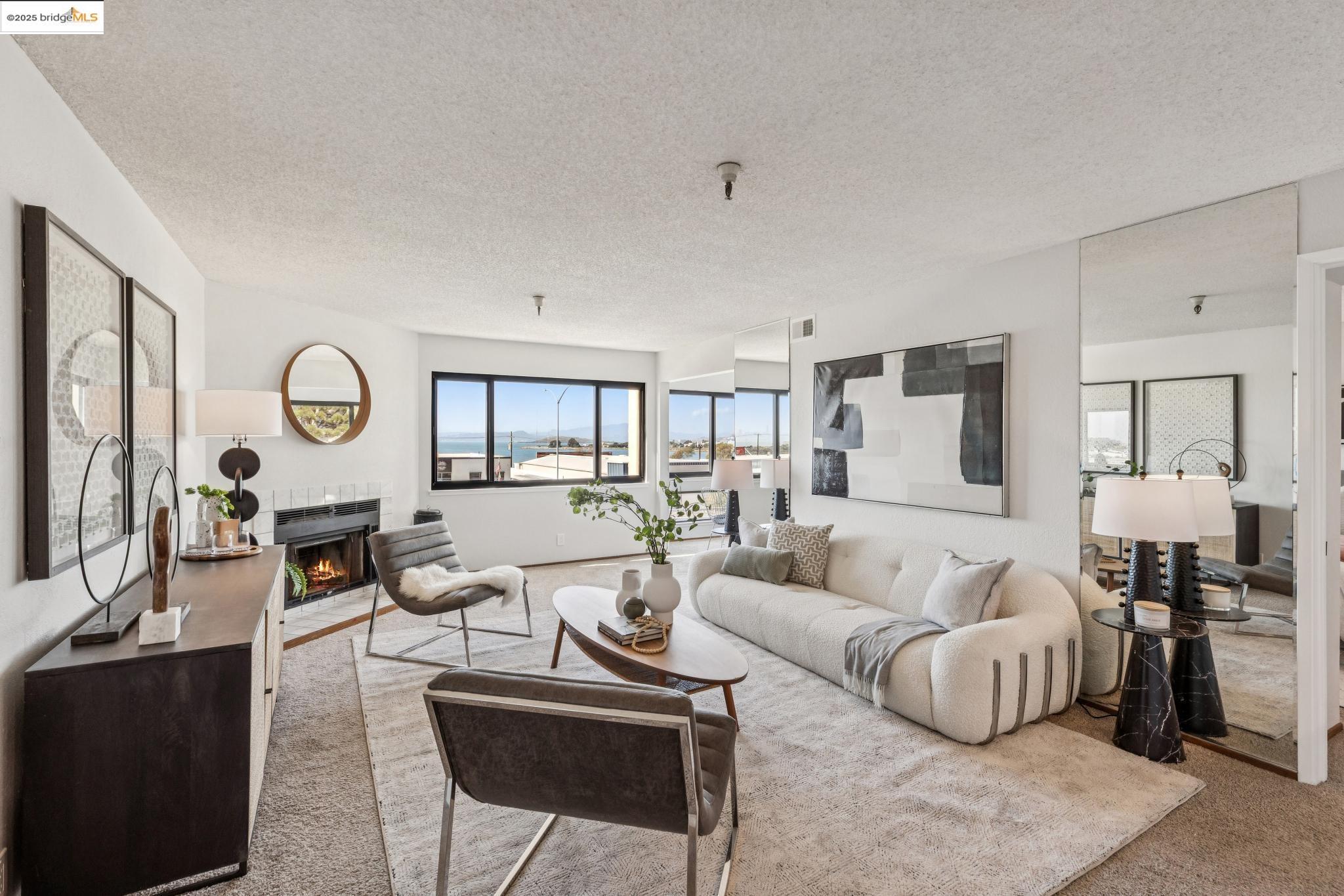 545 Pierce Street, Unit 1206 Albany, CA 94706 - Photo 4 of 44 a living room with furniture and a wooden floor